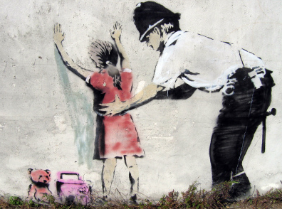 BANKSY_COP_FRISK_GIRL.jpg